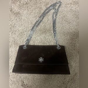 Kira turn-lock in dark suede Tory Burch